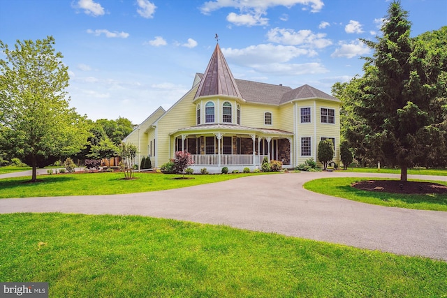 2375 Ballenger Creek Pike, Adamstown, MD 21710 - victorian home featuring curved driveway, a front lawn, a standing seam roof, and metal roof