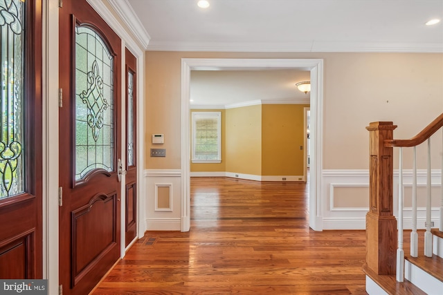 2375 Ballenger Creek Pike, Adamstown, MD 21710 - entryway featuring wood finished floors, stairway, a wainscoted wall, ornamental molding, and recessed lighting