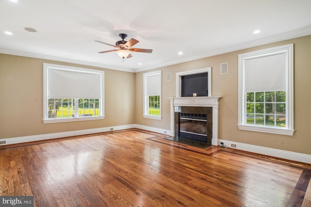 2375 Ballenger Creek Pike, Adamstown, MD 21710 - unfurnished living room featuring plenty of natural light, baseboards, wood finished floors, crown molding, and ceiling fan