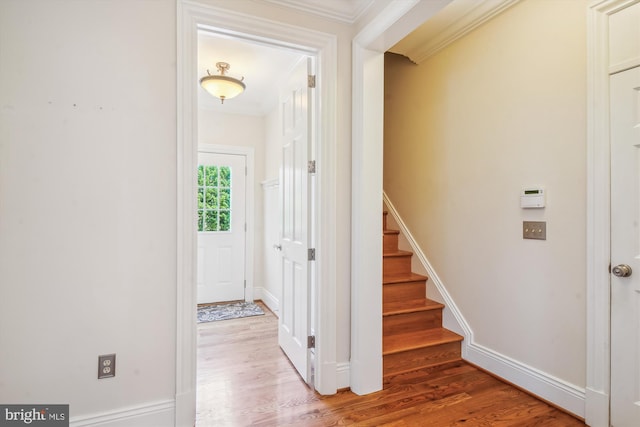 2375 Ballenger Creek Pike, Adamstown, MD 21710 - stairway with crown molding, wood finished floors, and baseboards