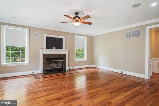 2375 Ballenger Creek Pike, Adamstown, MD 21710 - unfurnished living room with healthy amount of natural light, a premium fireplace, wood finished floors, ornamental molding, and a ceiling fan