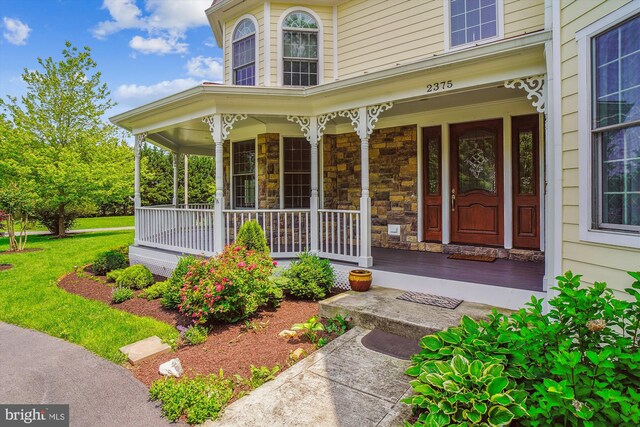 2375 Ballenger Creek Pike, Adamstown, MD 21710 - property entrance featuring covered porch and stone siding