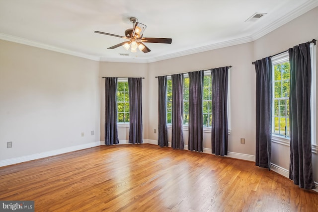 2375 Ballenger Creek Pike, Adamstown, MD 21710 - spare room featuring healthy amount of natural light, a ceiling fan, light wood-style flooring, baseboards, and crown molding