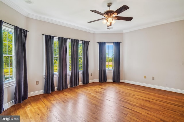 2375 Ballenger Creek Pike, Adamstown, MD 21710 - empty room with healthy amount of natural light, a ceiling fan, light wood finished floors, ornamental molding, and baseboards