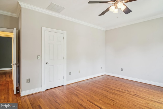 2375 Ballenger Creek Pike, Adamstown, MD 21710 - empty room featuring a ceiling fan, wood finished floors, baseboards, and ornamental molding