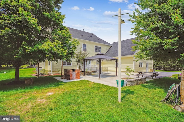 2375 Ballenger Creek Pike, Adamstown, MD 21710 - back of property featuring a patio area, a gazebo, a yard, and an outbuilding