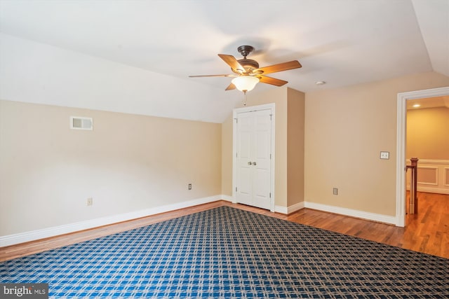 2375 Ballenger Creek Pike, Adamstown, MD 21710 - spare room with wood finished floors, a ceiling fan, vaulted ceiling, and baseboards