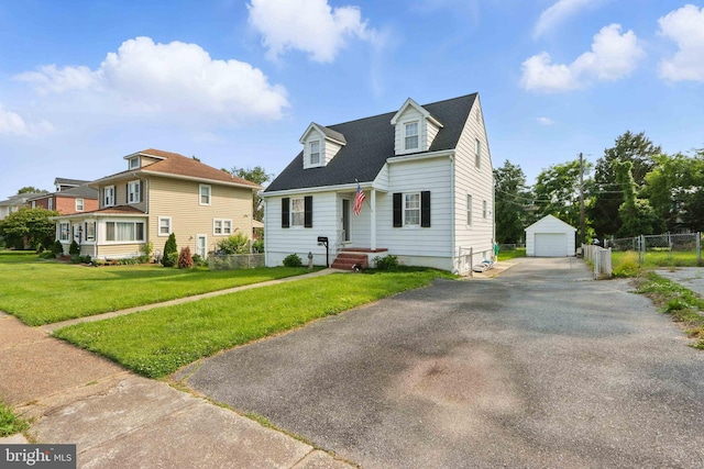 1022 S Beechfield Ave, Baltimore, MD 21229 - new england style home featuring a garage and an outbuilding