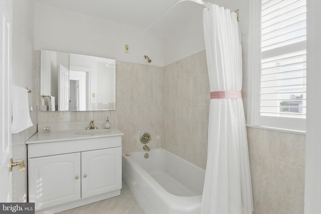 1022 S Beechfield Ave, Baltimore, MD 21229 - bathroom with tile walls, vanity, shower / bathtub combination with curtain, and tile patterned floors