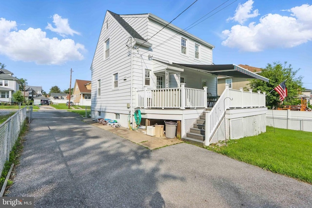 1022 S Beechfield Ave, Baltimore, MD 21229 - view of front of house with covered porch