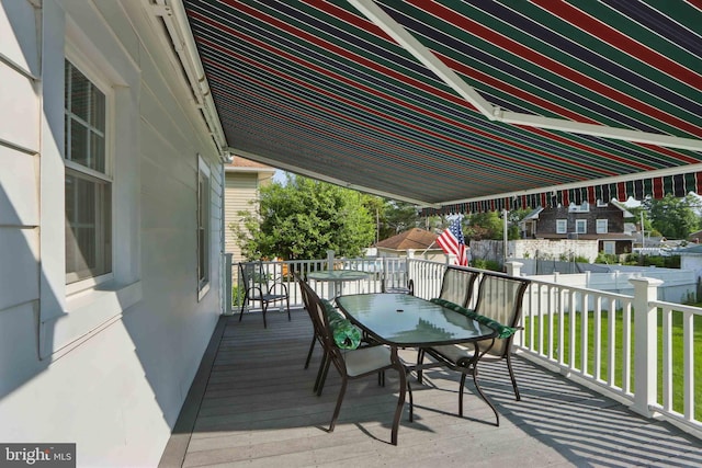 1022 S Beechfield Ave, Baltimore, MD 21229 - wooden terrace with outdoor dining area