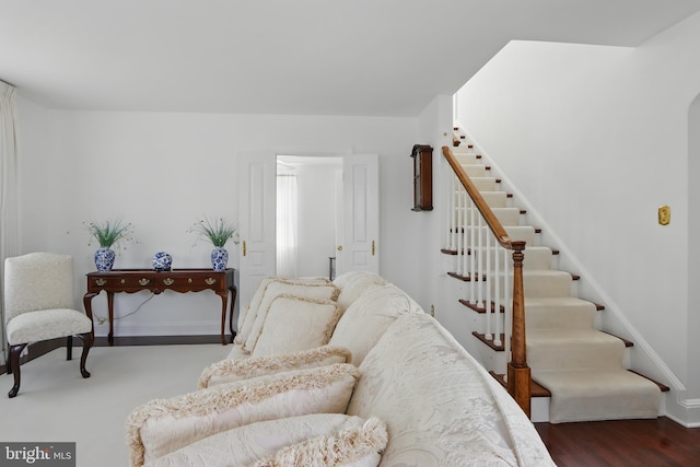 1022 S Beechfield Ave, Baltimore, MD 21229 - living room with stairway and baseboards