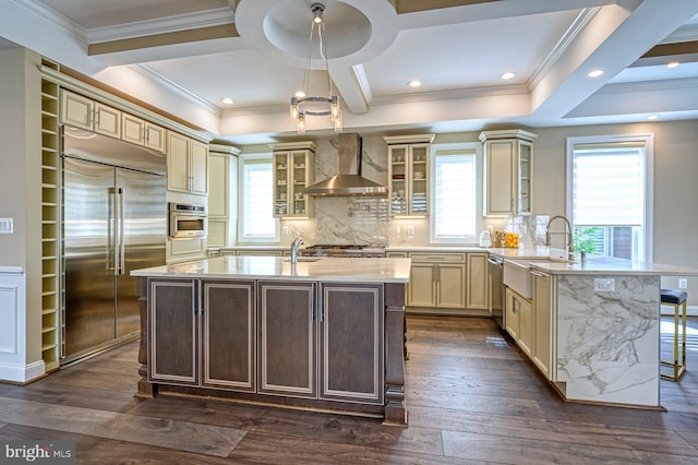 1600 Great Falls St, Mclean, VA 22101 - kitchen featuring wall chimney exhaust hood, stainless steel appliances, a sink, a peninsula, and ornamental molding