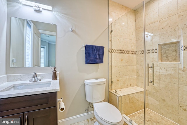 1600 Great Falls St, Mclean, VA 22101 - bathroom featuring toilet, a stall shower, vanity, and baseboards