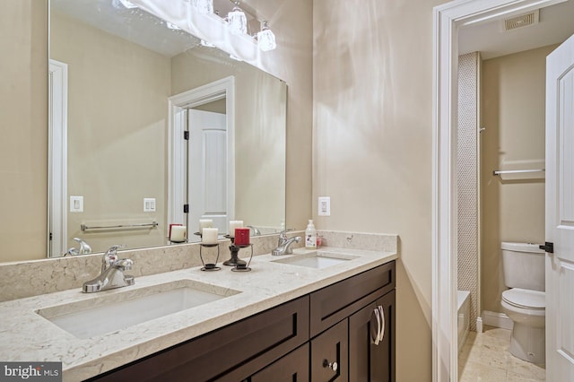 1600 Great Falls St, Mclean, VA 22101 - full bath featuring double vanity, toilet, and washtub / shower combination