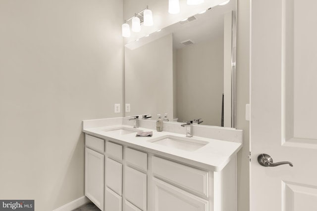 2521 River Terrace Rd, Hyattsville, MD 20782 - bathroom featuring double vanity and baseboards