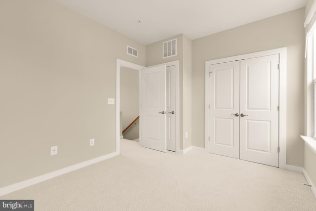2521 River Terrace Rd, Hyattsville, MD 20782 - unfurnished bedroom featuring light carpet, a closet, and baseboards