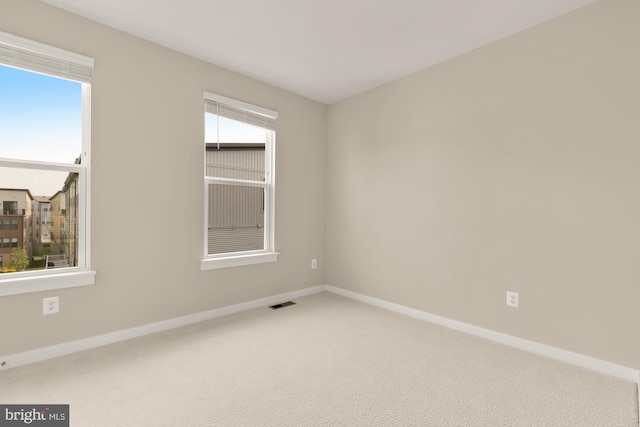 2521 River Terrace Rd, Hyattsville, MD 20782 - carpeted empty room featuring baseboards