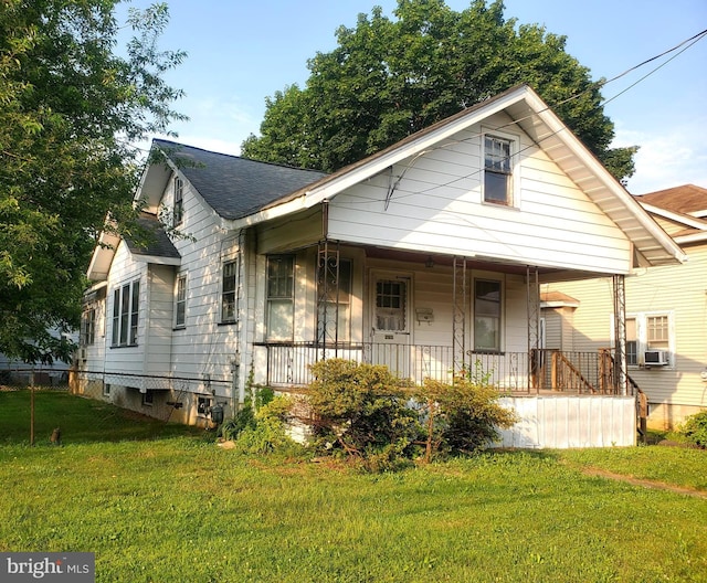 260 Weber Ave, Ewing, NJ 08638 - bungalow-style home with covered porch, a front lawn, and a shingled roof