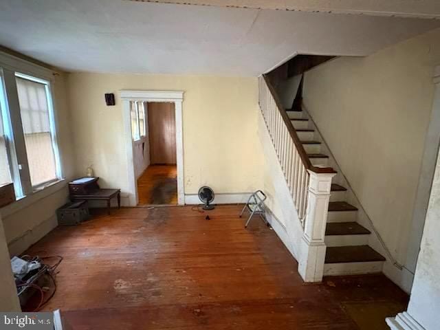 260 Weber Ave, Ewing, NJ 08638 - unfurnished living room featuring wood finished floors and stairs