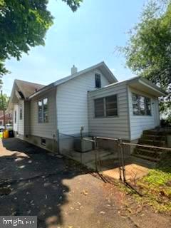 260 Weber Ave, Ewing, NJ 08638 - view of property exterior with a chimney