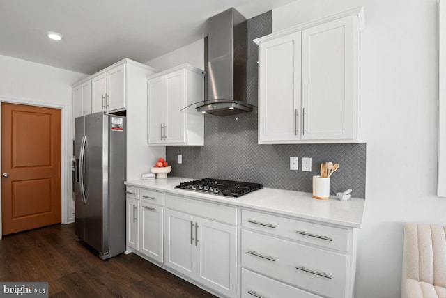453 Ensemble Way, Frederick, MD 21701 - kitchen featuring appliances with stainless steel finishes, wall chimney range hood, white cabinets, and tasteful backsplash