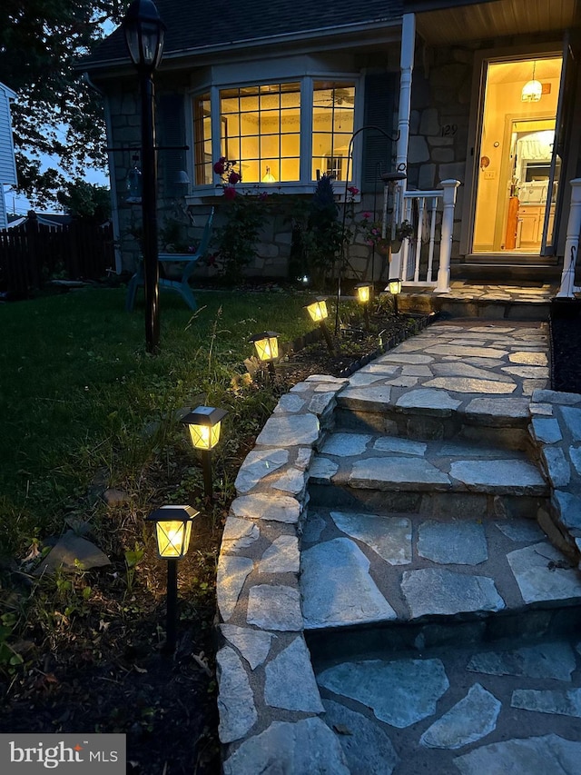 129 Redwood Ave, Trenton, NJ 08619 - entrance to property with stone siding and a yard