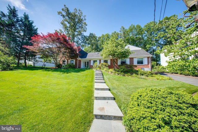 1440 Highwood Dr, Mclean, VA 22101 - view of front of home with a front yard and brick siding