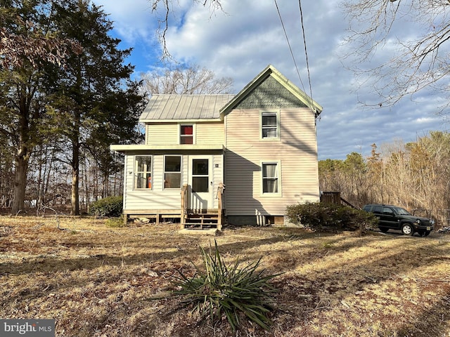 70 Steinfeld Ave, Pittsgrove, NJ 08318 - back of property with entry steps and a metal roof