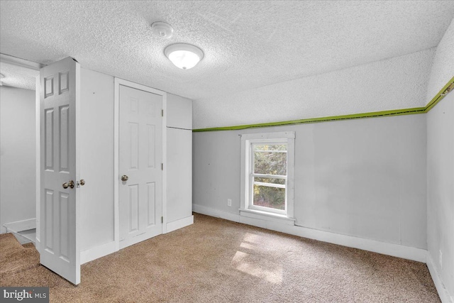 70 Steinfeld Ave, Pittsgrove, NJ 08318 - unfurnished bedroom featuring a textured ceiling, carpet, and a closet