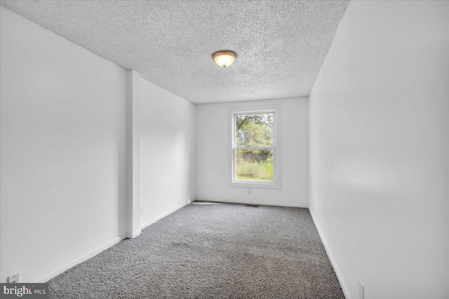 70 Steinfeld Ave, Pittsgrove, NJ 08318 - carpeted spare room with a textured ceiling and baseboards