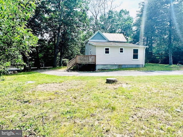 70 Steinfeld Ave, Pittsgrove, NJ 08318 - view of side of home featuring a wooden deck, a lawn, and stairway