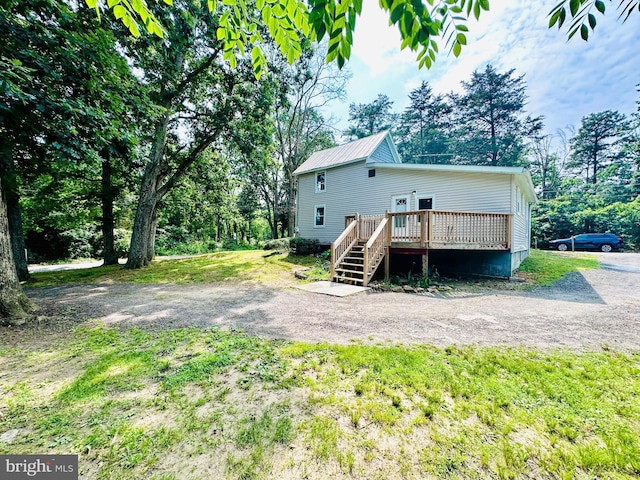 70 Steinfeld Ave, Pittsgrove, NJ 08318 - rear view of house with a wooden deck, a metal roof, and stairs