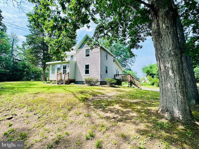 70 Steinfeld Ave, Pittsgrove, NJ 08318 - back of house featuring a wooden deck, a yard, and stairs