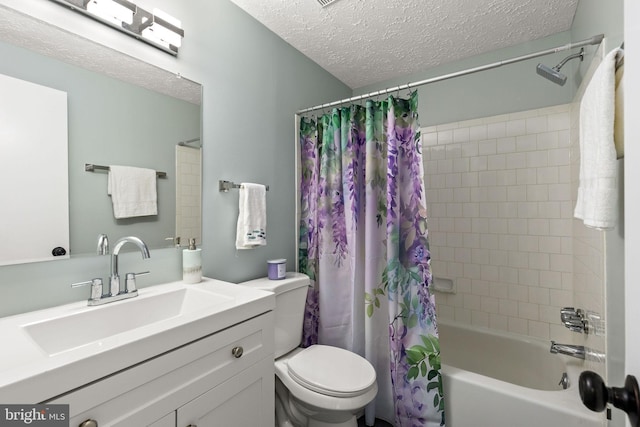1207 Blithe Ct, Upper Marlboro, MD 20774 - bathroom featuring toilet, a textured ceiling, vanity, and shower / bath combo with shower curtain