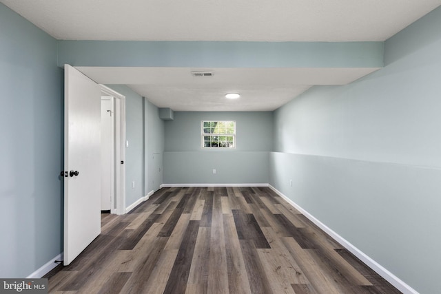 1207 Blithe Ct, Upper Marlboro, MD 20774 - unfurnished room with dark wood-type flooring and baseboards