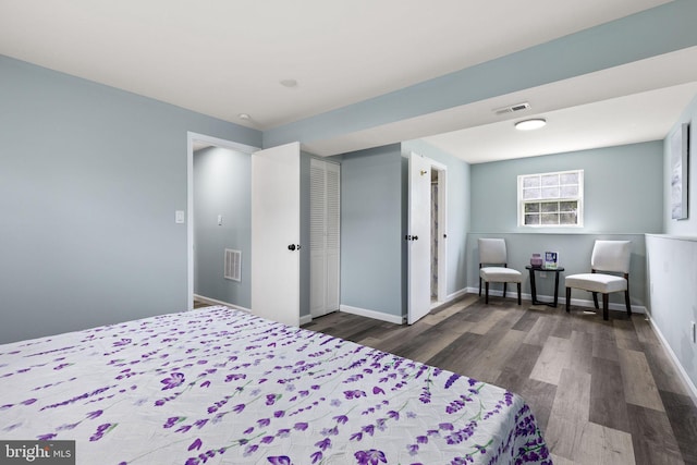 1207 Blithe Ct, Upper Marlboro, MD 20774 - bedroom with dark wood-style floors and baseboards