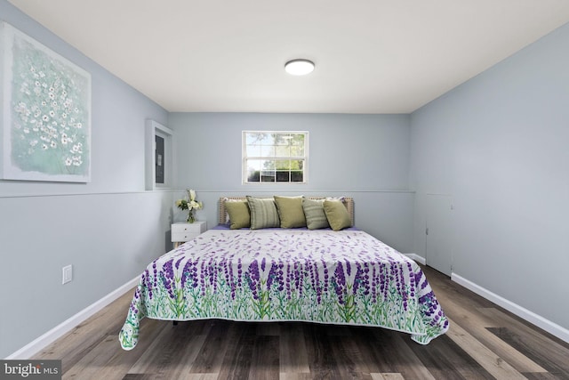 1207 Blithe Ct, Upper Marlboro, MD 20774 - bedroom with baseboards and wood finished floors