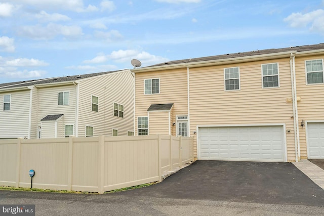 41706 Deer Grass Ter, Aldie, VA 20105 - view of front facade featuring asphalt driveway and an attached garage