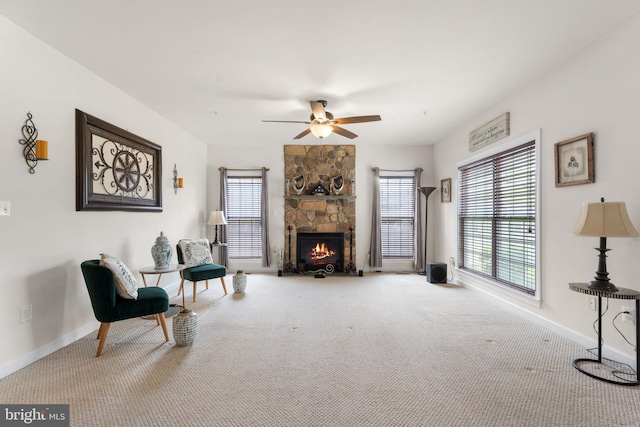 14207 Pollin St, Accokeek, MD 20607 - sitting room featuring carpet, a ceiling fan, and a fireplace