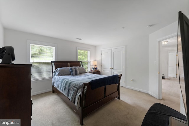 14207 Pollin St, Accokeek, MD 20607 - bedroom with light carpet and a closet