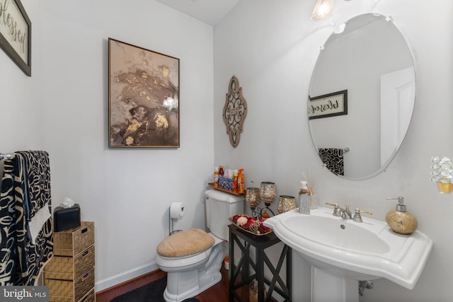 14207 Pollin St, Accokeek, MD 20607 - bathroom with toilet and wood finished floors