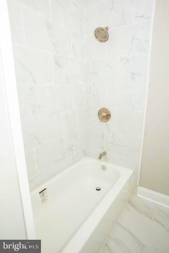 1626 N 30th St, Philadelphia, PA 19121 - full bathroom with marble finish flooring, shower / bathtub combination, and baseboards