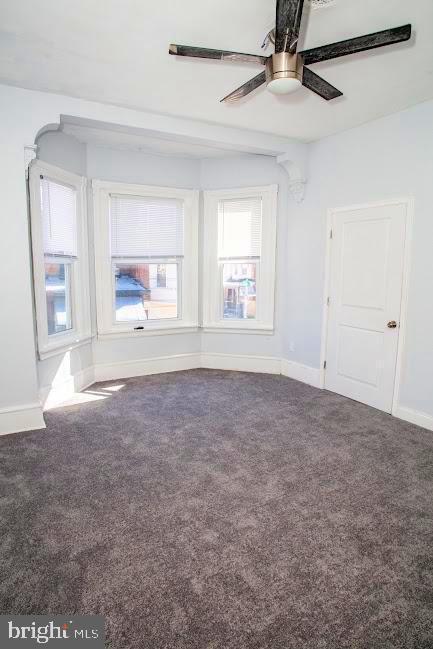 1626 N 30th St, Philadelphia, PA 19121 - empty room with ceiling fan, carpet, and baseboards