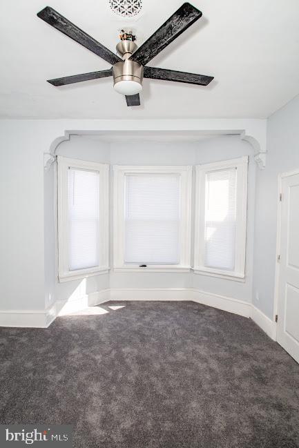 1626 N 30th St, Philadelphia, PA 19121 - spare room featuring carpet floors, baseboards, and a ceiling fan