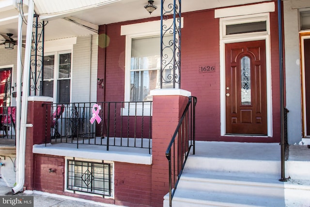 1626 N 30th St, Philadelphia, PA 19121 - property entrance featuring covered porch and brick siding