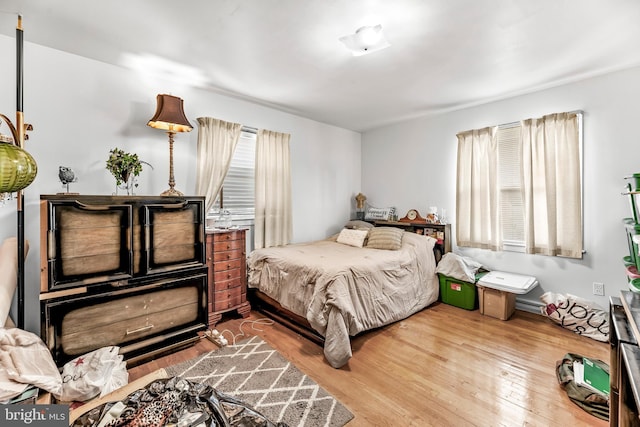 5915 Cable Ave, Suitland, MD 20746 - bedroom with wood finished floors and baseboard heating