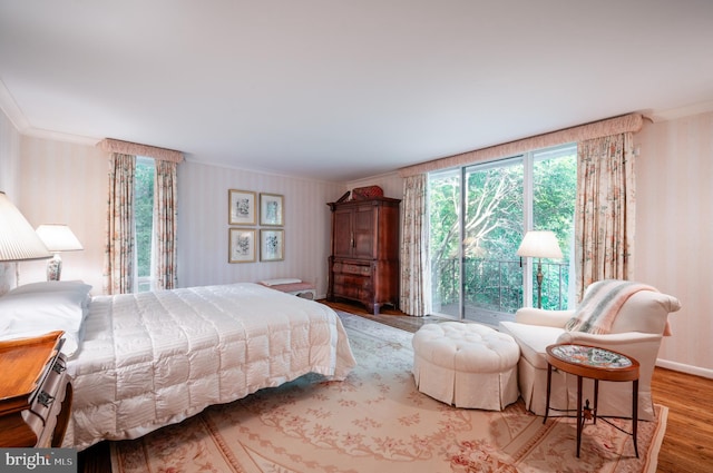 6501 Menlo Rd, Mclean, VA 22101 - bedroom featuring wood finished floors, wallpapered walls, crown molding, and baseboards