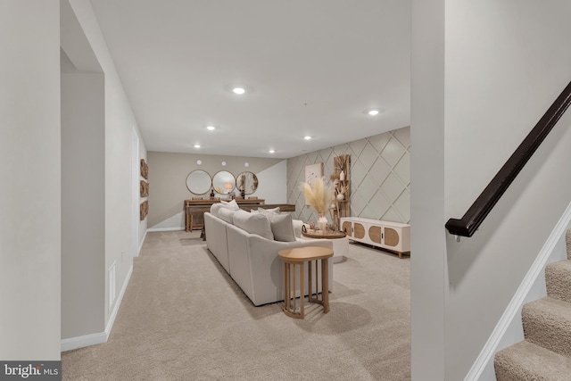 465 Hanson St, Frederick, MD 21701 - living room with light colored carpet, stairs, recessed lighting, an accent wall, and bar area