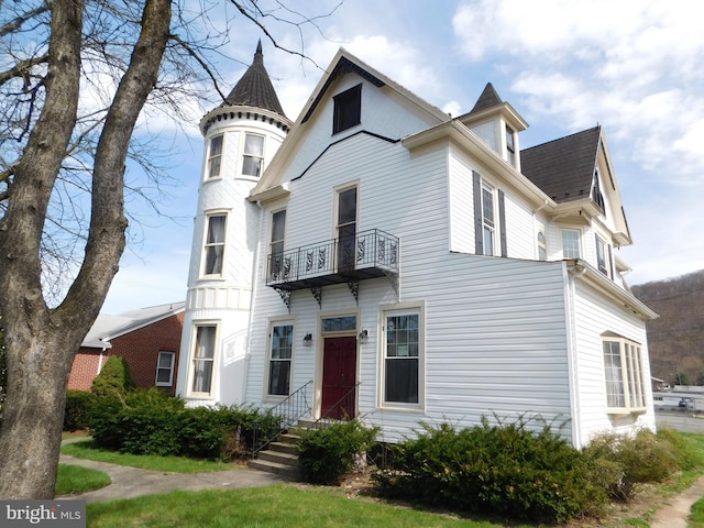 89 S Mineral St, Keyser, WV 26726 - victorian house with a balcony